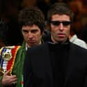 Oasis singer Liam Gallagher say brother Noel phoned him “begging for forgiveness”.