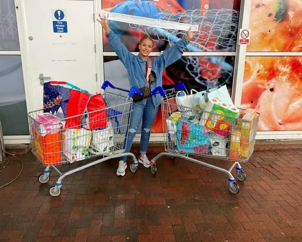 Only Fans star Amber O’Donnel at Tesco after shopping for her food parcel donations - Credit: SWNS