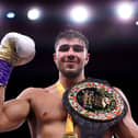 Tommy Fury poses for a photo with their Title Belt after defeating Jake Paul during the Cruiserweight Title fight between Jake Paul and Tommy Fury at the Diriyah Arena on February 26, 2023 in Riyadh, Saudi Arabia. (Photo by Francois Nel/Getty Images)