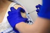 Every adult in England will be able to book their Covid-19 vaccine from today (Getty Images)