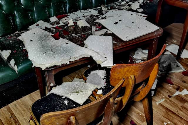 The pub seating in a state of disrepair.