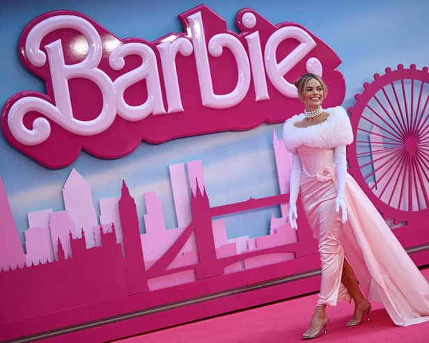 Australian actress Margot Robbie poses on the pink carpet upon arrival for the European premiere of “Barbie” in central London.