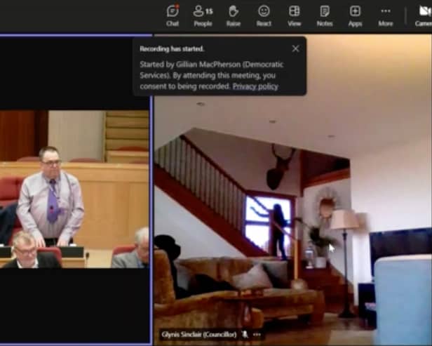 Cllr Glynis Campbell Sinclair was spotted cleaning her windows while  on camera during a meeting of Highland Council's Inverness Area Committee Picture: Highland Council  / SWNS