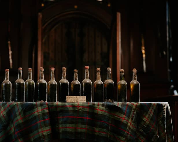 The world's oldest whisky that was found hidden in a Scottish castle and was sipped by a young Queen Victoria is being auctioned - and many bottles are going for more than £10,000 Picture: Whisky Auctioneer / Spey / SWNS