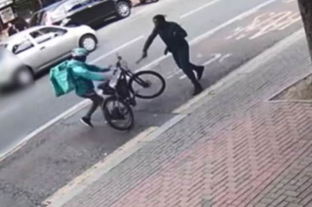 A knife-wielding man attacks a Deliveroo rider.