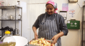 One of the Kitchen of Hope chefs preparing some food
