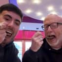 Callum Ryan and his dad Darren Ryan trying 'London's hottest curry' at Aladin in Brick Lane.