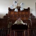 Wayne Colquhoun stands at the pulpit in the former Chapel Salem.