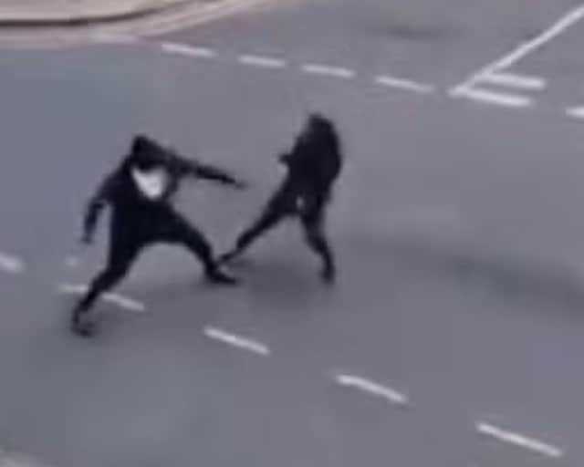 Two men seen fighting with Rambo knives on Cadoxton Avenue in Tottenham
