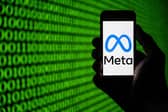 Meta logo on a smartphone. Photo by SEBASTIEN BOZON/AFP via Getty Images