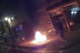 Fires burn outside London shops as police race to extinguish blazes.