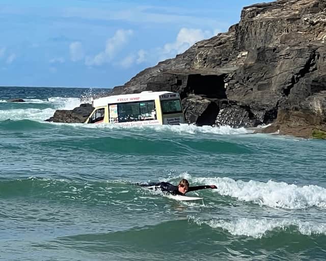 An ice cream van that has been washed out to sea, Harlyn Bay beach, North Cornwall.