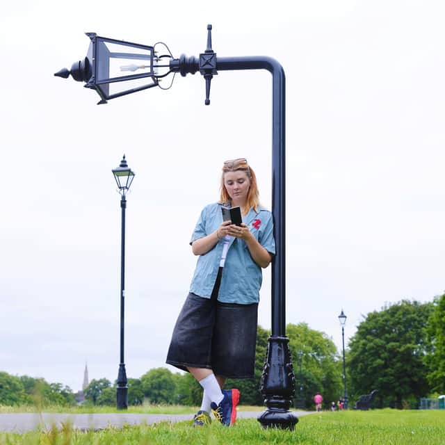 A folded bench and lamppost created by Jem Hughes appears in Clapham Common.