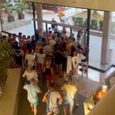 Holidaymakers queue at the doors of the Villa Romana hotel in Salou, Spain at 7.55am, on August 7, before making a chaotic dash for the sunbeds. 