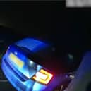 Police punched and pinned to ground after pulling driver over.