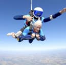 Manette Baillie, from Benhall in Suffolk, does a tandem skydive at the age of 102.