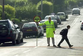 Children are being urged to look up from their phones when they cross the road, in a new safety campaign by children's newspaper First News (Photo by National World)