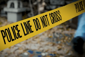Police tape across crime scene