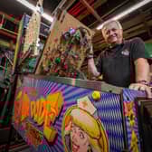 Dr Pinball Mark Squires at his home in Swavesey, Cambridgeshire where he fixes and restores pinball machines.