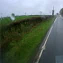 Norman Chai smashes into oncoming traffic as he loses control after overtaking a lorry.