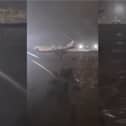 Valencia Airport runway submerged in flood water.