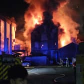 Firefighters tackling a huge fire at the former Dog Inn on Church Street, Preston