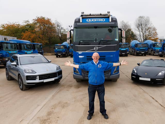 Jimmy Callaghan, Omaze double Porsche Early Bird winner with his brand new Cayenne and Boxter cars alongside his work lorry. 