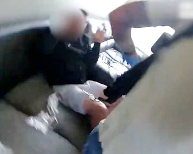 Two bungling drug dealers were caught red-handed after police found one sitting on the sofa weighing piles of cocaine. 