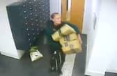 This is the moment a bold thief walks into a luxury apartment block and steals residents Amazon parcels.  