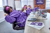 A group of Bensons workers come together to celebrate the humble yawn