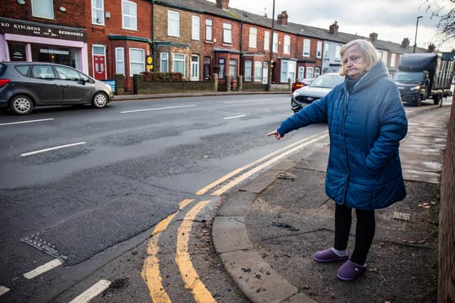 Freda Smith, 73, pictured outside her house on Liverpool Road in Eccles, Greater Manchester