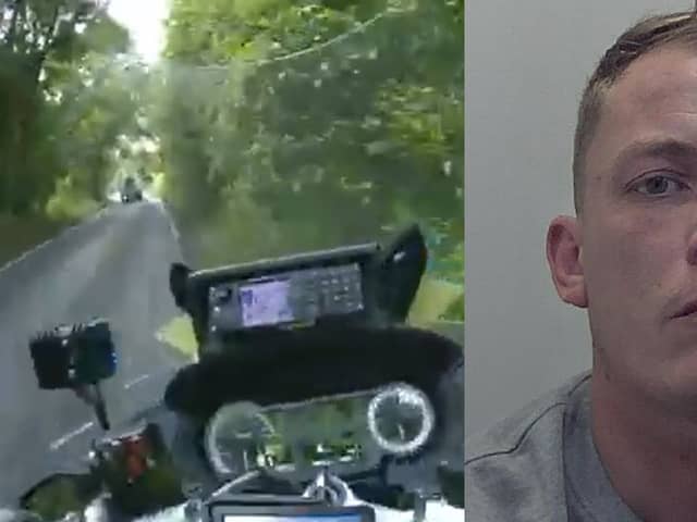 Dangerous driver reverses into police motorbike.