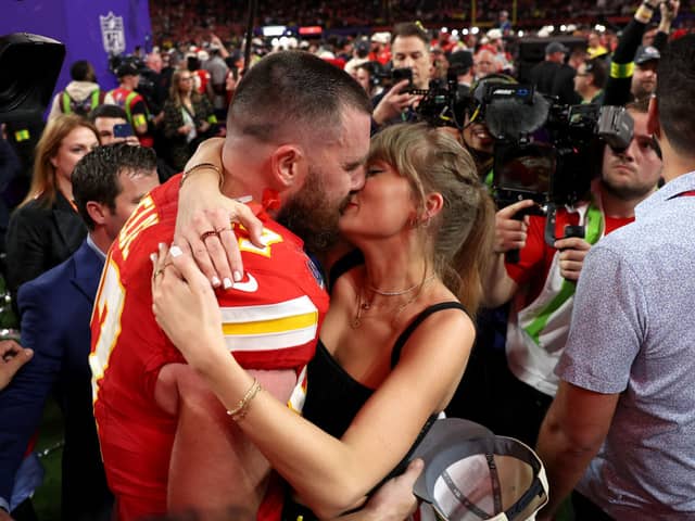 Will Travis Kelce propose to Taylor Swift during Superbowl Halftime? : Travis Kelce #87 of the Kansas City Chiefs and Taylor Swift embrace after defeating the San Francisco 49ers in overtime during Super Bowl LVIII at Allegiant Stadium on February 11, 2024 in Las Vegas, Nevada. Photo: Ezra Shaw/Getty Images
