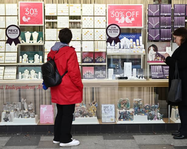 Two women look at a jewellery shop window in Stevenage, north of London, in 2024 (Photo: JUSTIN TALLIS/AFP via Getty Images)