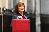 Rachel Reeves, poses with the red Budget Box as she leaves 11 Downing Street to present the government's annual budget to Parliament in October 2024.
