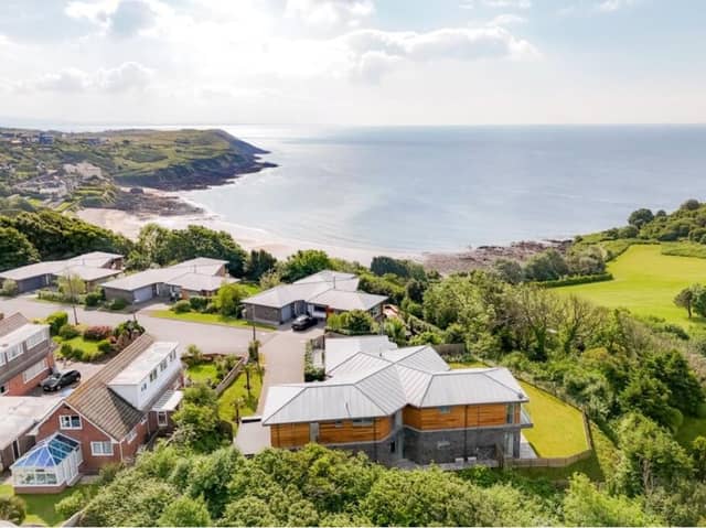 The Gower Peninsula in Swansea is one of the best places to live in the UK, according to the Sunday Times. This fabulous four-bedroom house looks out over Langland Bay, with its lovely sunny beach, and the nearby golf course.