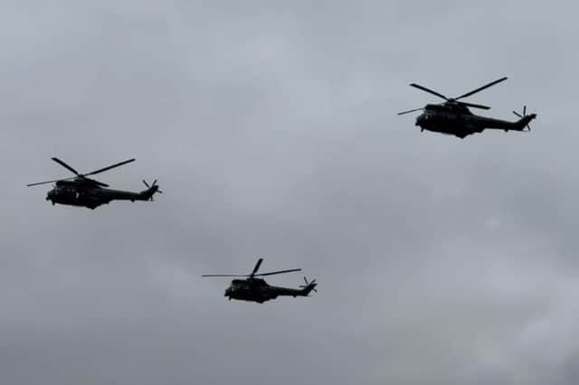 Puma helicopters fly over RAF Cosford.