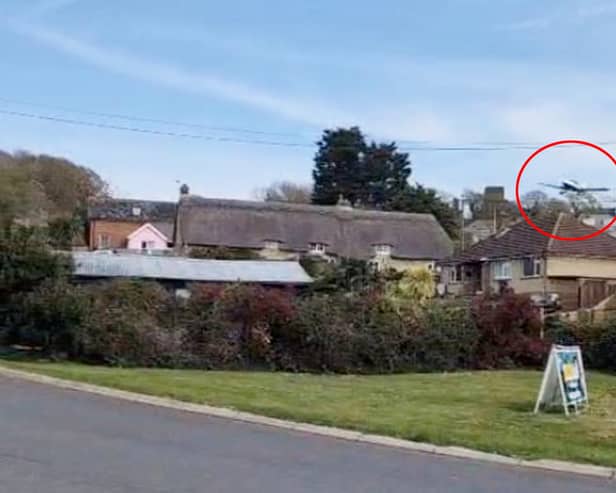 A dramatic video captures the moment a plane came in low and hit a chimney before crashing at an Isle of Wight holiday park.