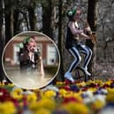 Rachel Ward plays the saxophone while riding a unicycle in Stanley Park
