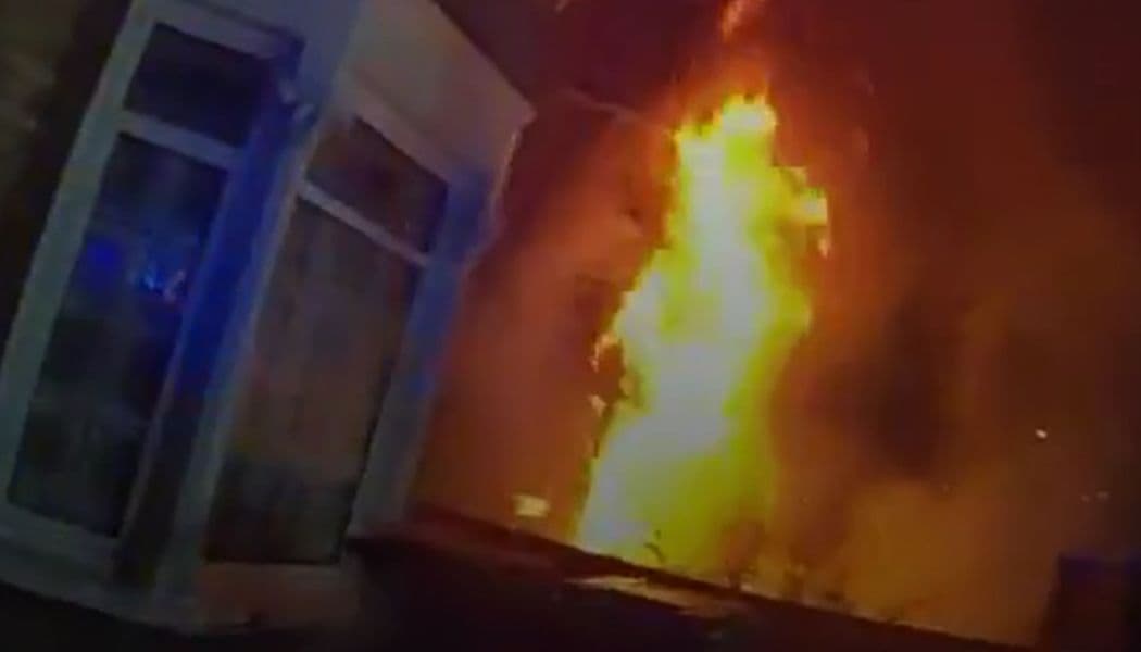 In the footage, officers can be heard shouting, “Get away from the ...