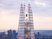 Superman soars above London in a spectacular display at the highest point of The Shard