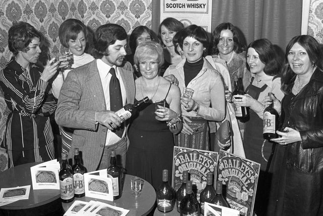 Pub regulars gather at The White Horse in Standishgate, Wigan, to enjoy a whisky tasting evening in 1978
