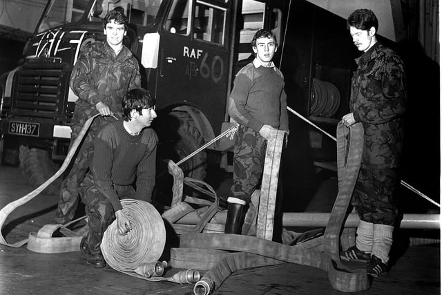 Wigan TA soldiers during a fire fighting exercise at the Drill Hall in 1978