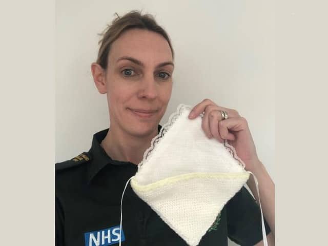 Jenni McClagish, patient safety specialist with EEAST, with a cuddle pocket
