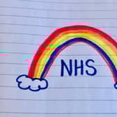Did you place a rainbow drawing in your window?
