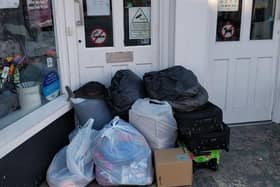 The bags left outside the Age UK shop. Photo: Lesley Whiteman.