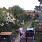 Phil Durham running the marathon in his garden.