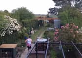Phil Durham running the marathon in his garden.