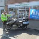 Andy Cowley (left), who delivers medicine on his motorcycle, and chairman John Robertson (right)