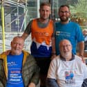 Runners Matt Pullinger and Matt Guest with their dads, John Pullinger and Malc Guest